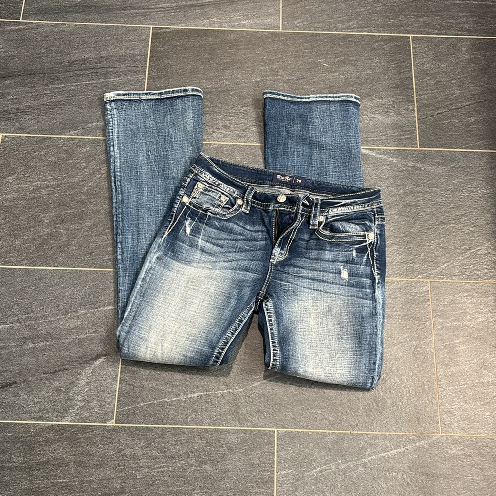 Miss Me 34” Boot Cut Jeans with Silver Fleur de Lis pockets